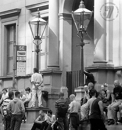 GayFest 2001:  people wait for the parade, outside the art gallery