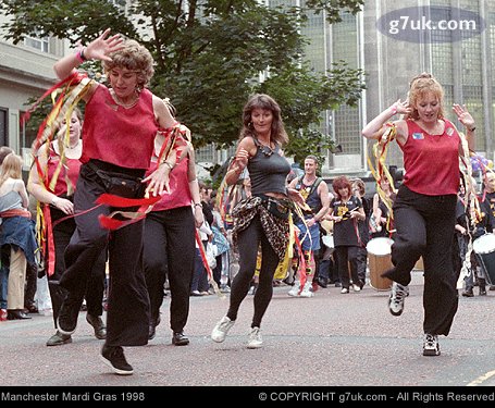 Dancing women with ribbons