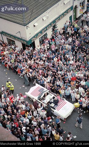 Crowds line the streets and every vantage point